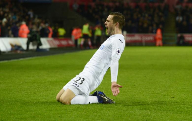 Swansea City's Gylfi Sigurdsson celebrates scoring their second goal