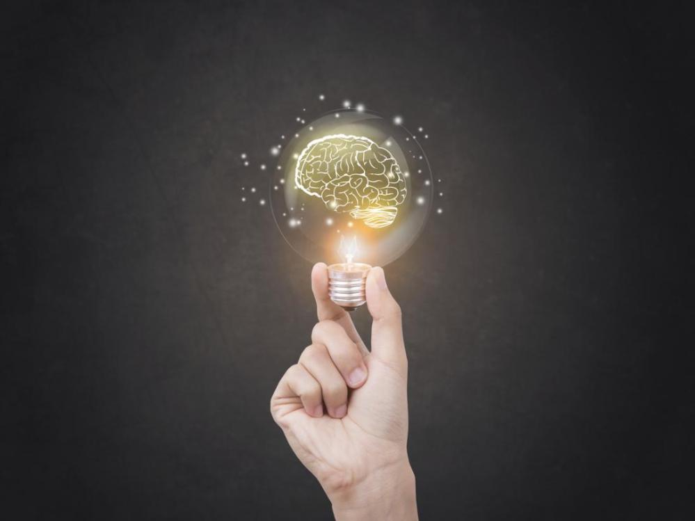 hand-holding-brain-lightbulb